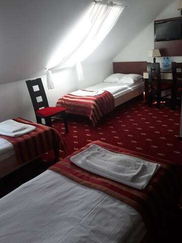 Фото номера Трехместный номер Отель Hotel Jagiełło г. Хрубешув 5