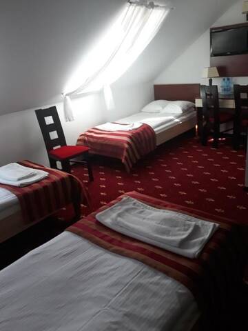 Фото номера Трехместный номер Отель Hotel Jagiełło г. Хрубешув 9