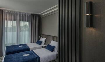 Фото номера Двухместный номер Делюкс с 2 отдельными кроватями Отель Hotel &amp; Restauracja Gniecki г. Хрубешув 4